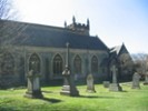 Gravestone with rear of Church